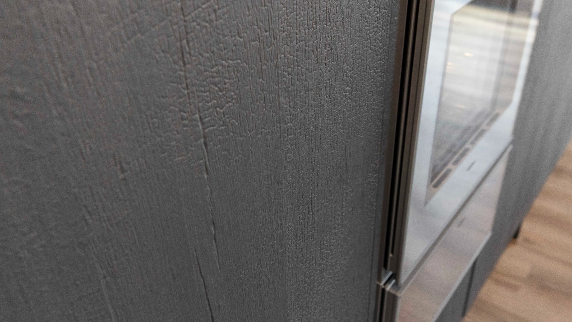 Elementa Vorführküche Industriestahl PG9 Vulkaneiche mit Industriestahl und Glas schwarz matt